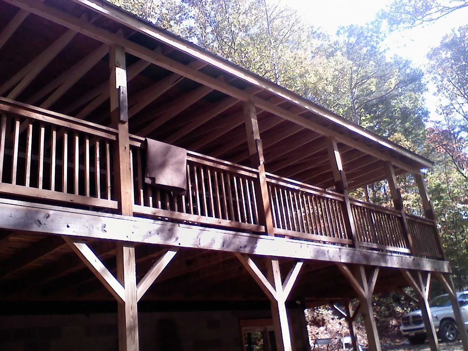 Timber framing under a new elevated porch and deck — Roof Leak Repair in Davis by Roofing Brothers